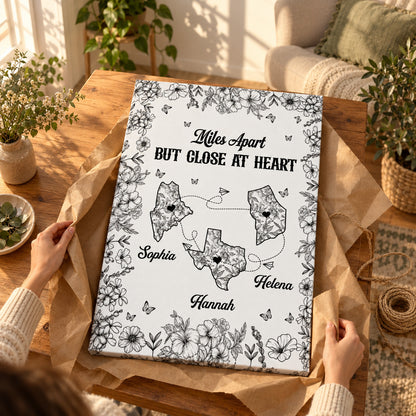 Miles Apart But Close At Heart Toile Pattern - Personalized Poster And Canvas Print — Hands unwrapping the canvas from kraft paper